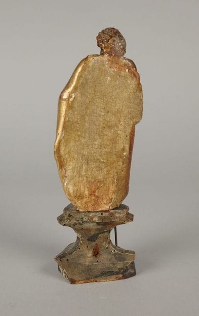 Saint holding a crosier in his right hand,...