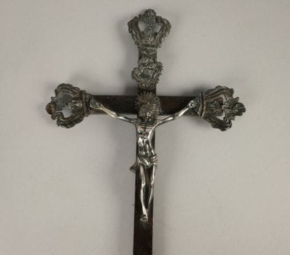 Silver Christ on the cross, surmounted by...