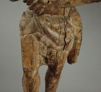 Carved wooden Christ in bonds with traces...