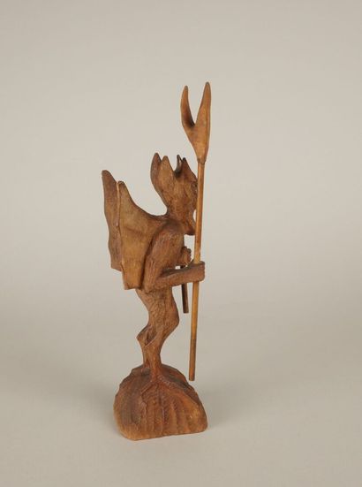 20th century. Winged devil holding pitchfork...