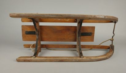 Antique wooden sled with metal runners
84...