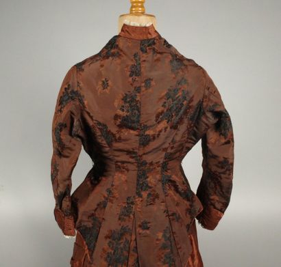 BRESSE. A so-called “tournure” dress made...
