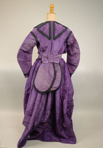 Day dress in purple silk moiré, circa 1860–1870....