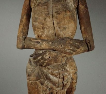 Carved wooden Christ in bonds with traces...