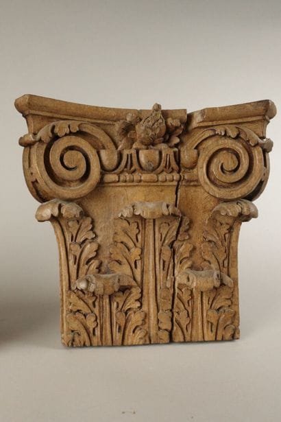 Three sections of Corinthian capitals made...