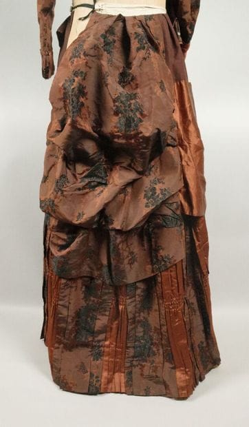 BRESSE. A so-called “tournure” dress made...