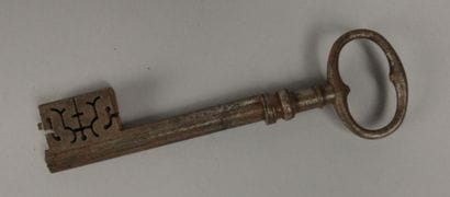 Wrought-iron key with an oval ring featuring...