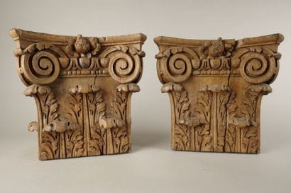 Three sections of Corinthian capitals made...
