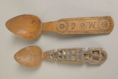 Set of spoons consisting of two wooden spoons—one...