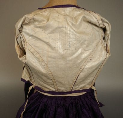 Day dress in purple silk moiré, circa 1860–1870....