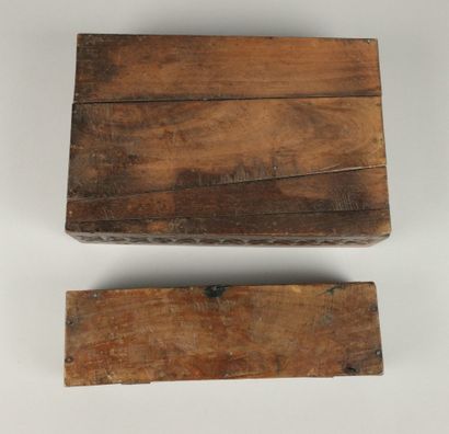 Set includes: - A carved wooden box with...