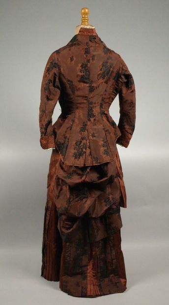 BRESSE. A so-called “tournure” dress made...