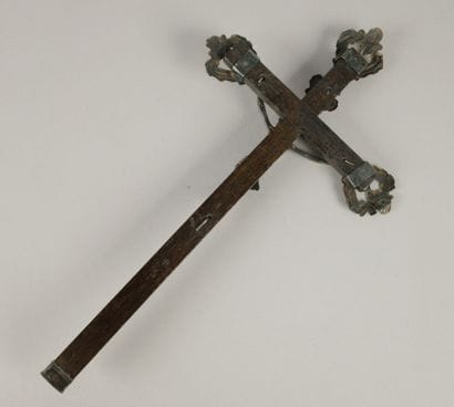 Silver Christ on the cross, surmounted by...