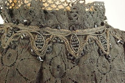 BRESSE, circa 1880. Black silk satin cape,...