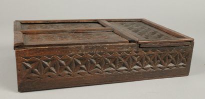 Set includes: - A carved wooden box with...