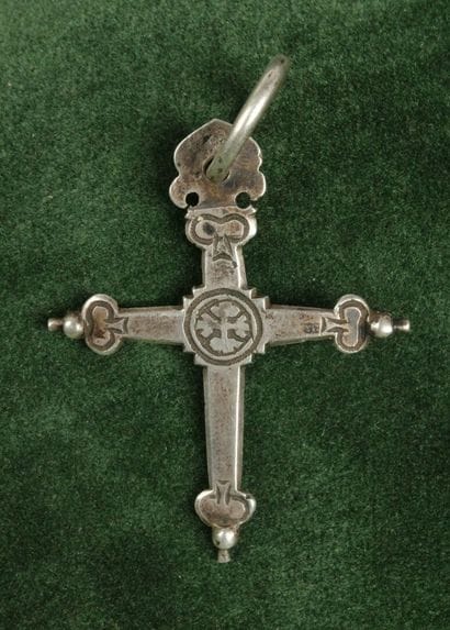 Silver Jeannette Cross with a chased St....