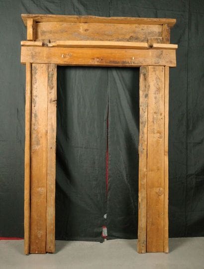 Antique wooden facade richly carved with...
