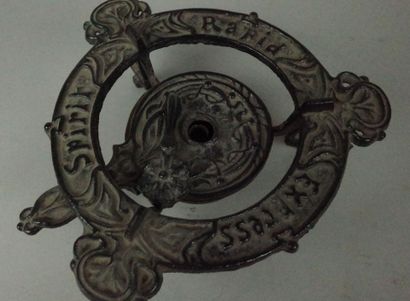 Small cast-iron Art Nouveau-style three-legged...