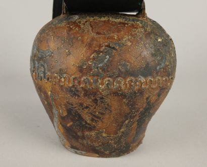 Soldered copper bell with a wave pattern...