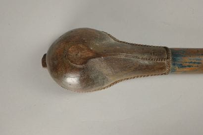 Set including a wooden rattle, a two-compartment...