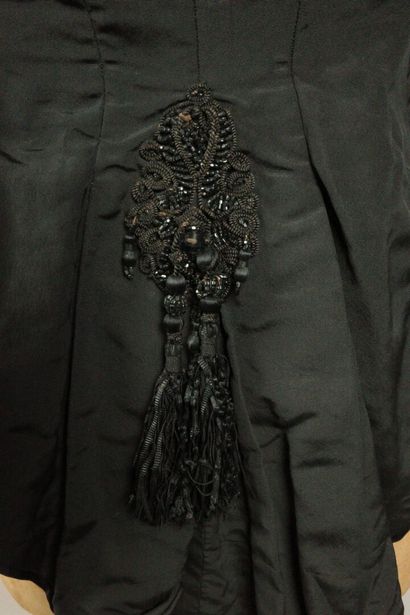 Flared dress, circa 1880–1885. Black silk...