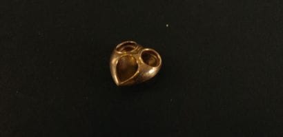 Small heart pendant in 750 yellow gold. Eagle's...