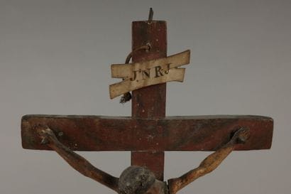 Crucifix: a polychrome carved wooden figure...