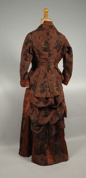 BRESSE. A so-called “tournure” dress made...
