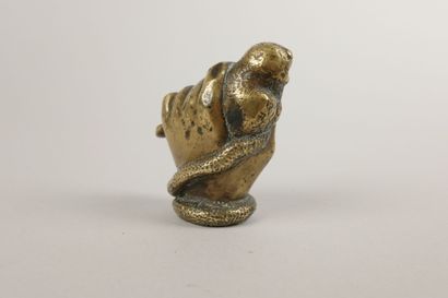 Bronze knob depicting a hand clutching an...