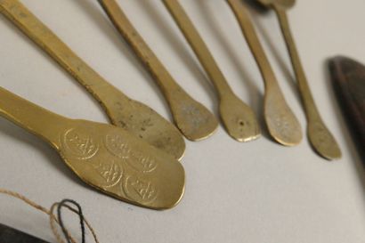 Set of spoons consisting of two wooden spoons—one...