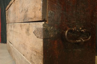 Natural oak cabinet with an ornate front,...