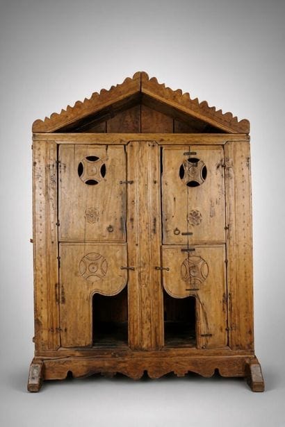 Small sideboard with a crenellated pediment...