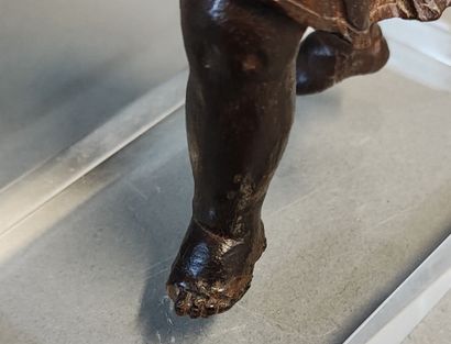 Putto with bugle. Wooden statuette carved...
