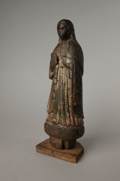 Devotional statue of the Virgin Mary, carved...