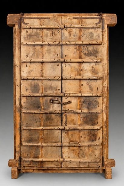 Frame with two natural wood doors richly...