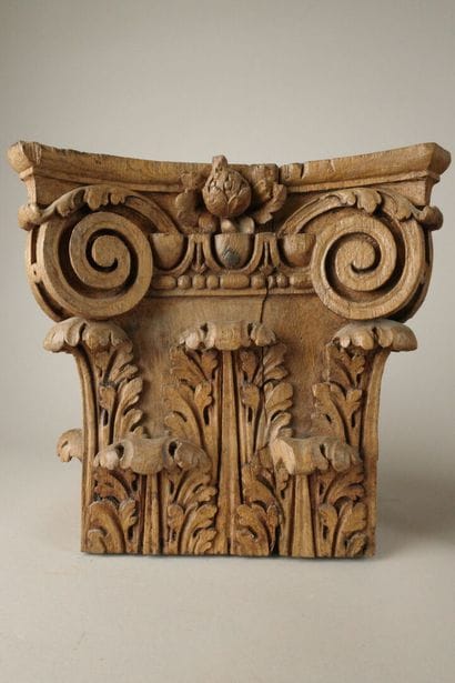 Three sections of Corinthian capitals made...