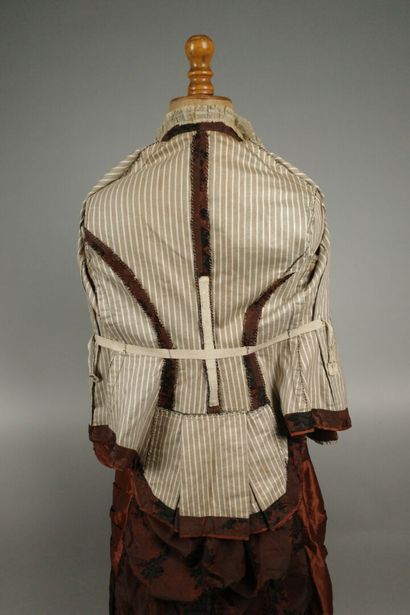 BRESSE. A so-called “tournure” dress made...