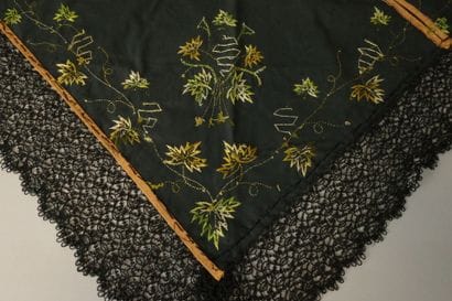 SAVOIE. Triangular shawl made of black silk...