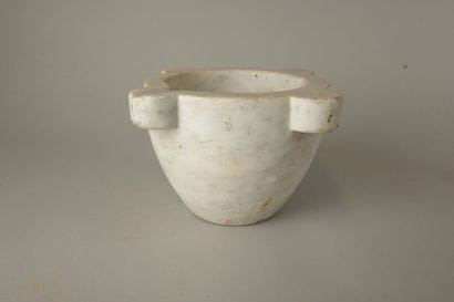 White marble mortar with 4 wings and a wooden...