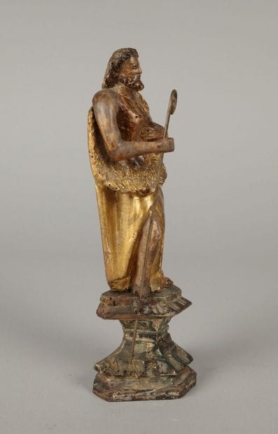 Saint holding a crosier in his right hand,...