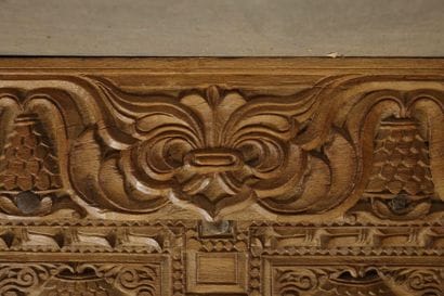 Frame with two natural wood doors richly...