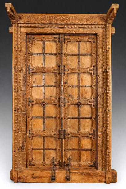 Frame with two natural wood doors richly...