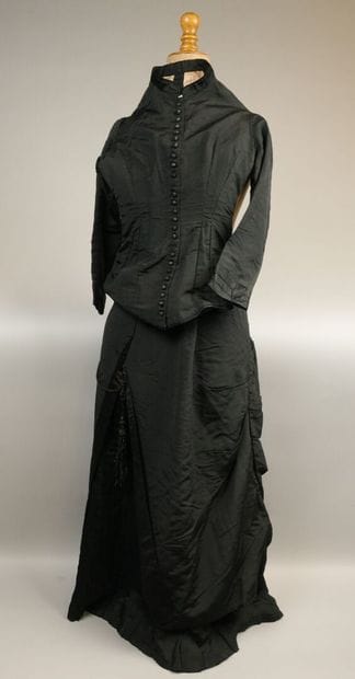 Flared dress, circa 1880–1885. Black silk...