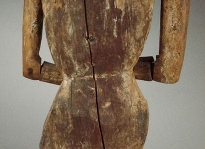 Carved wooden Christ in bonds with traces...