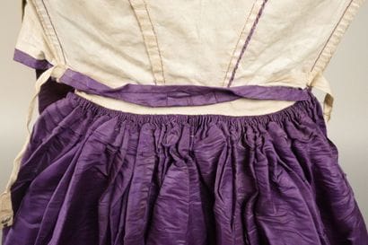 Day dress in purple silk moiré, circa 1860–1870....