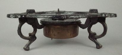 Small cast-iron Art Nouveau-style three-legged...