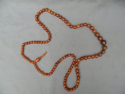 Collier bouddhiste en perles d'ambre et buis...