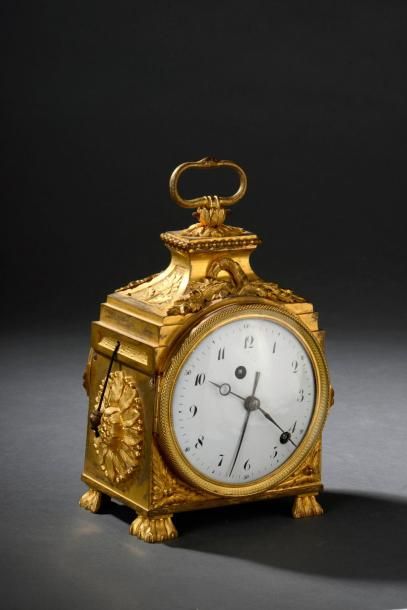 Pendule d'officier en bronze ciselé et doré,...