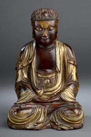 Statuette de Bouddha en bois laqué rouge...