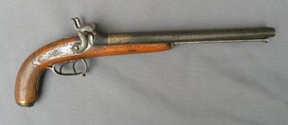Long pistolet double à percussion. Canons...